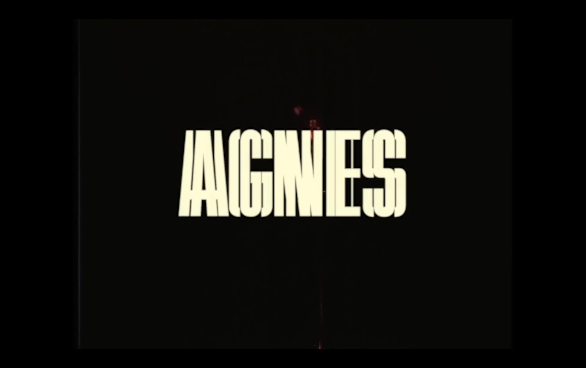 Music video title card with bold typography